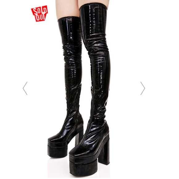 skin tight black knee high boots